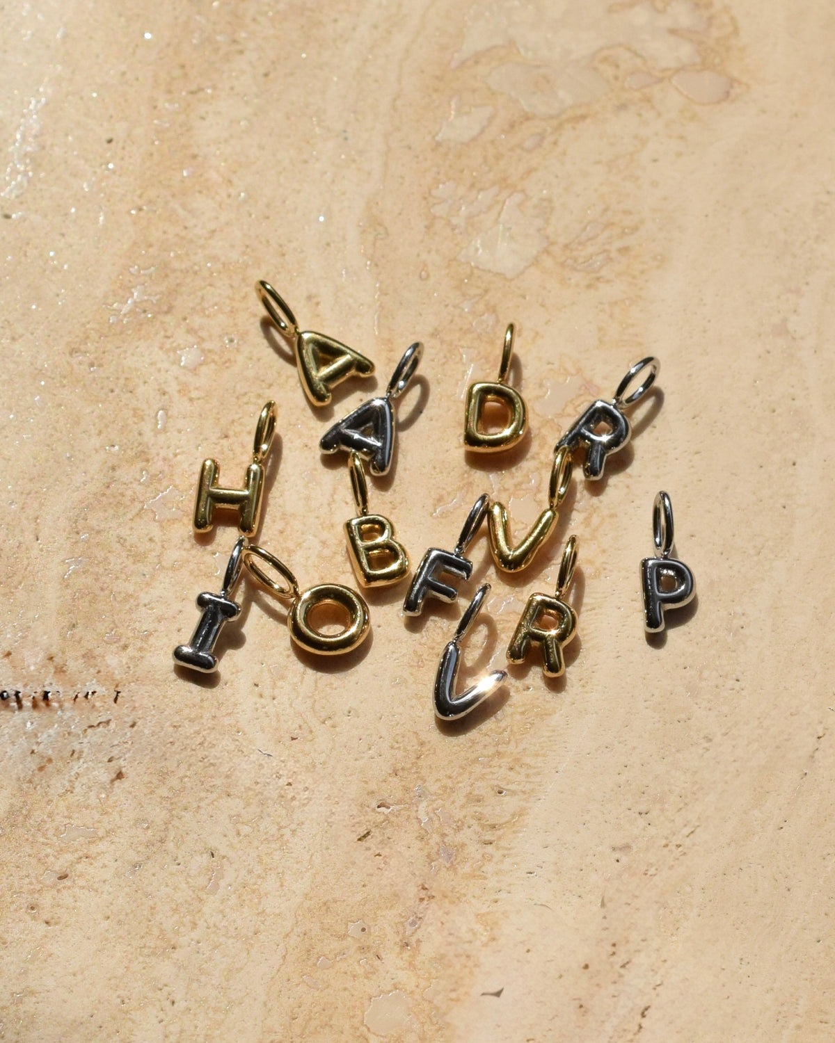 INITIAL Charm